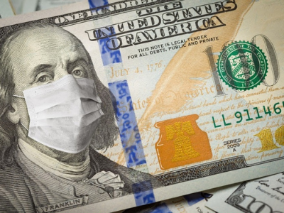 A US $100 bill with Ben Franklin wearing a medical face mask.