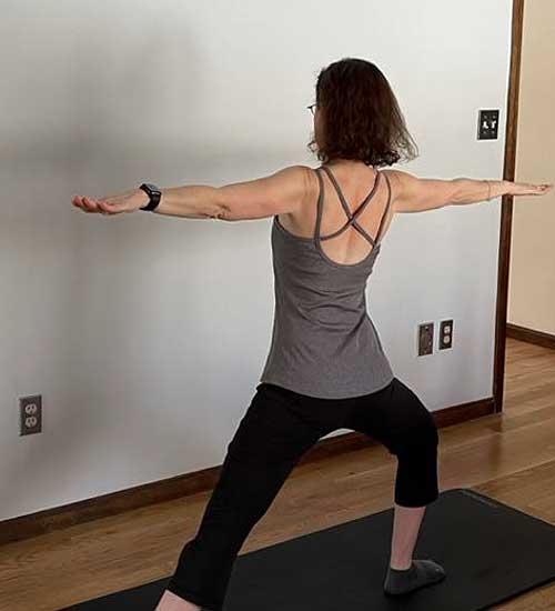 Jill Blumen in a yoga pose